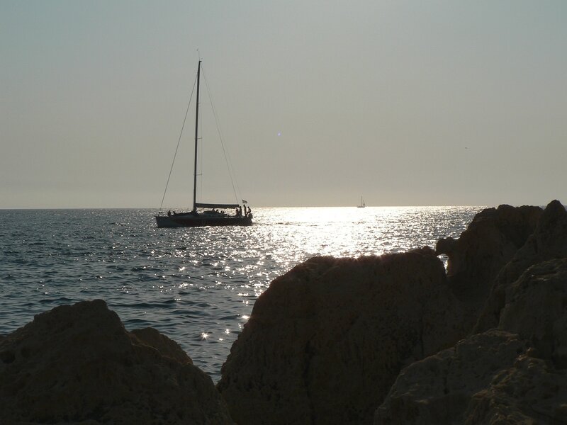 Sailboat on the Sea — Blue, Serene, Sunset, Photograph