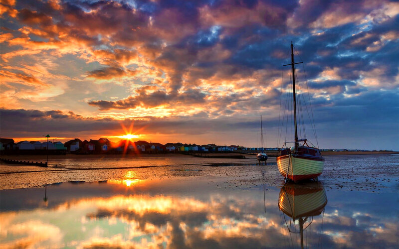 Sailboat on Tidal Flats — Orange