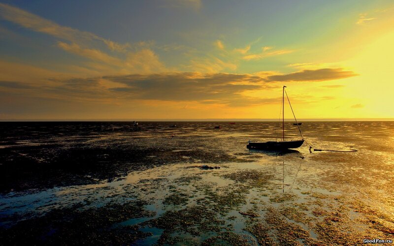Sailboat on Tidal Flats