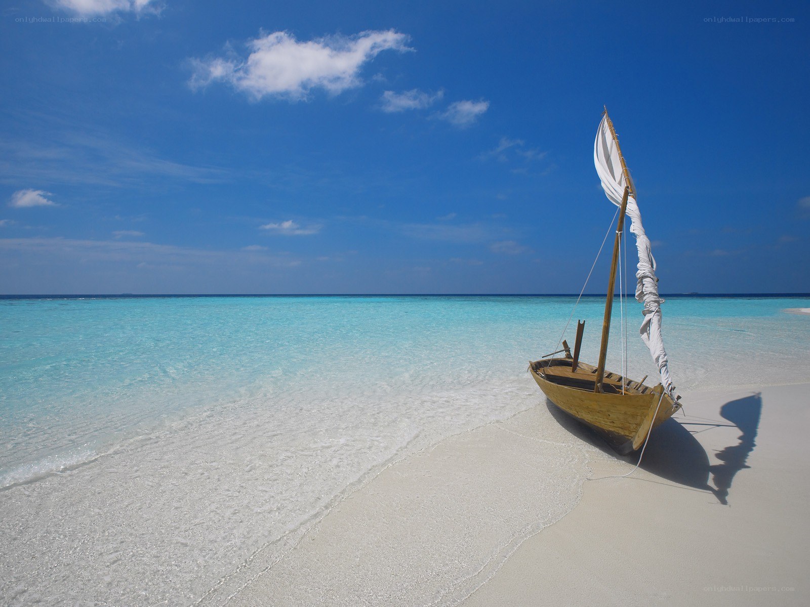 Sailboat on tropical beach