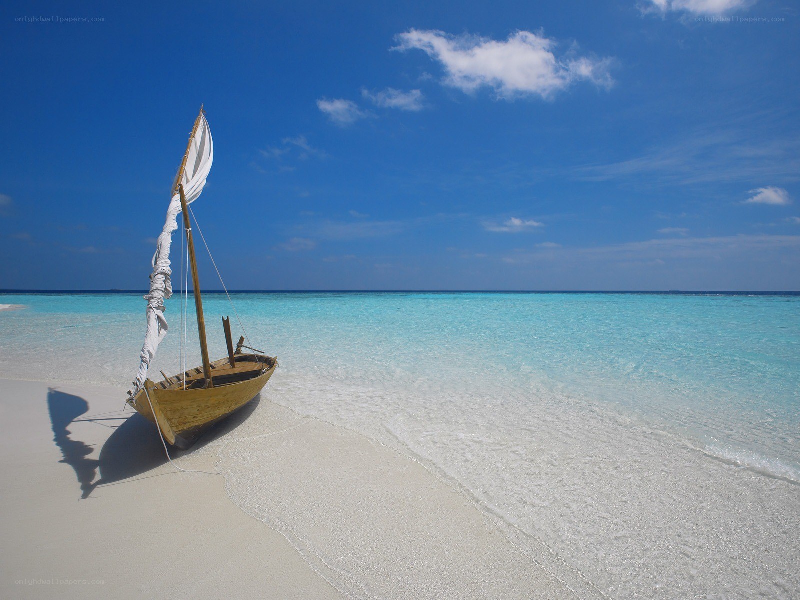 Sailboat on tropical beach