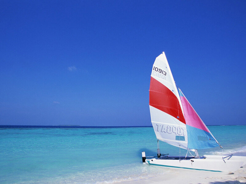 Sailboat on tropical beach