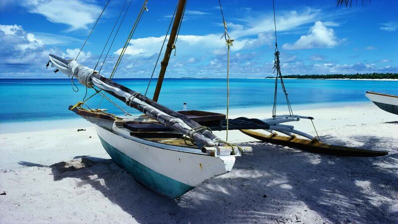 Sailboat on tropical beach