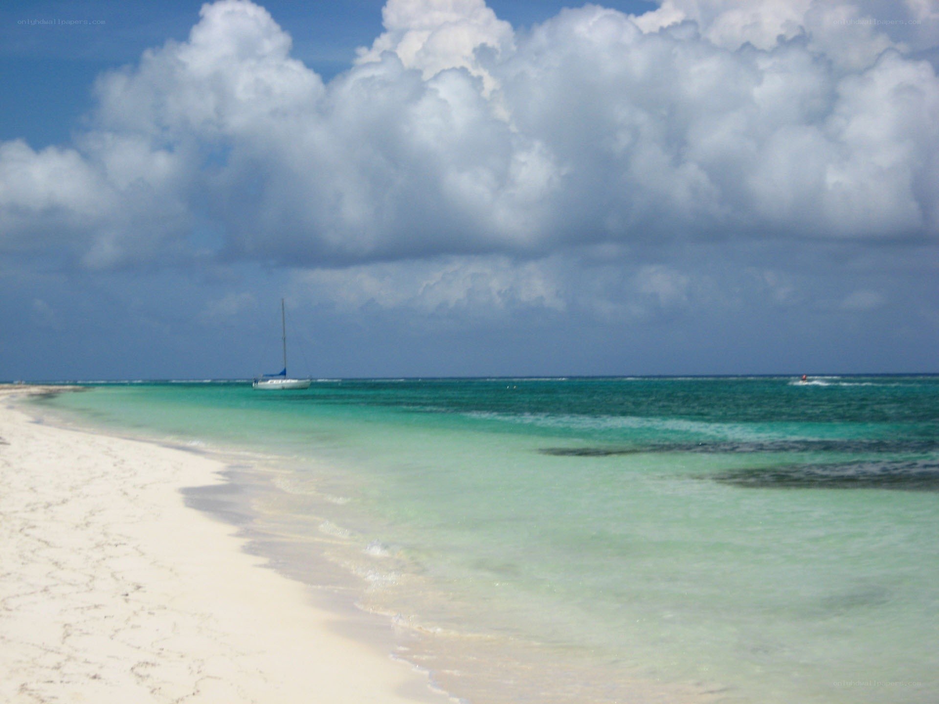 sailboat on tropical beach