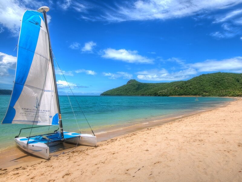 Sailboat on tropical beach