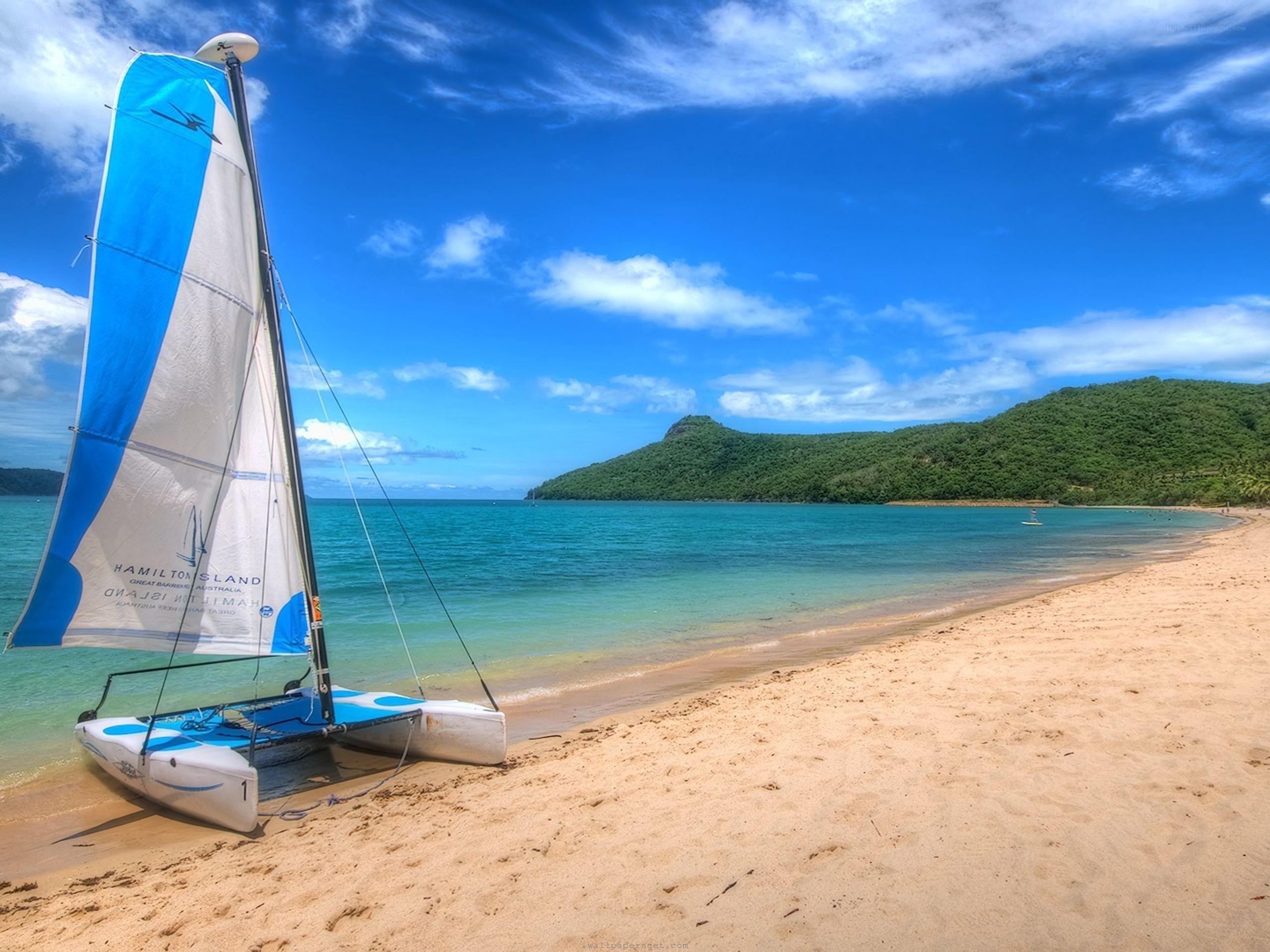 Sailboat on tropical beach