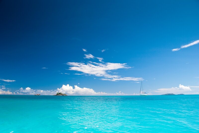 Sailboat on turquoise sea