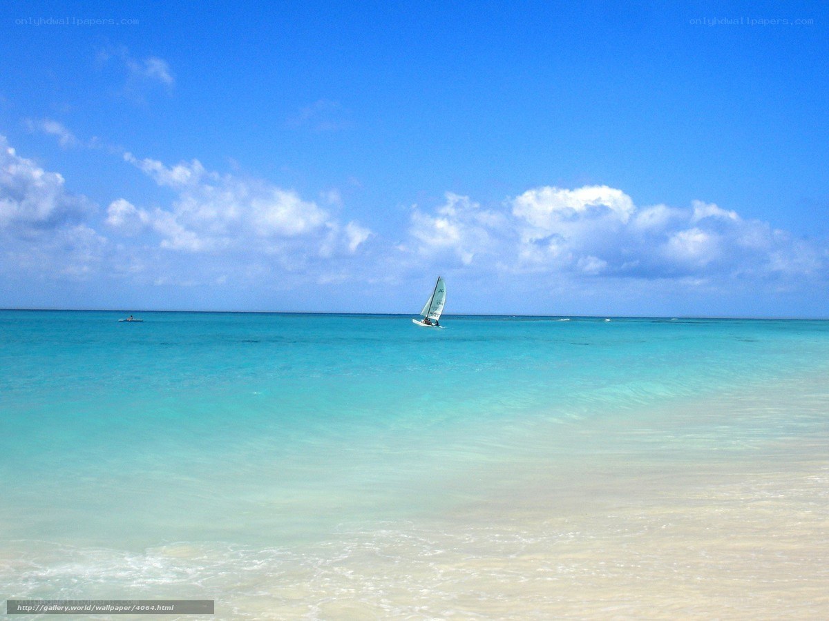 Sailboat on turquoise sea