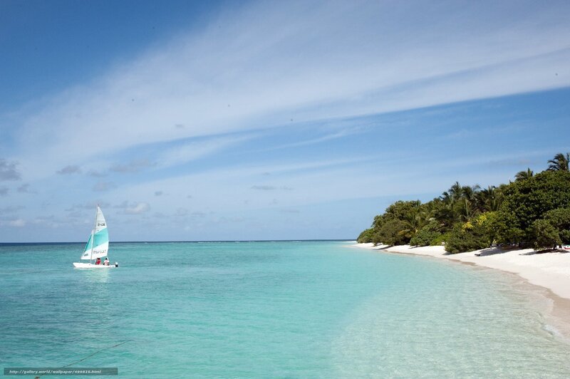 sailboat on turquoise water