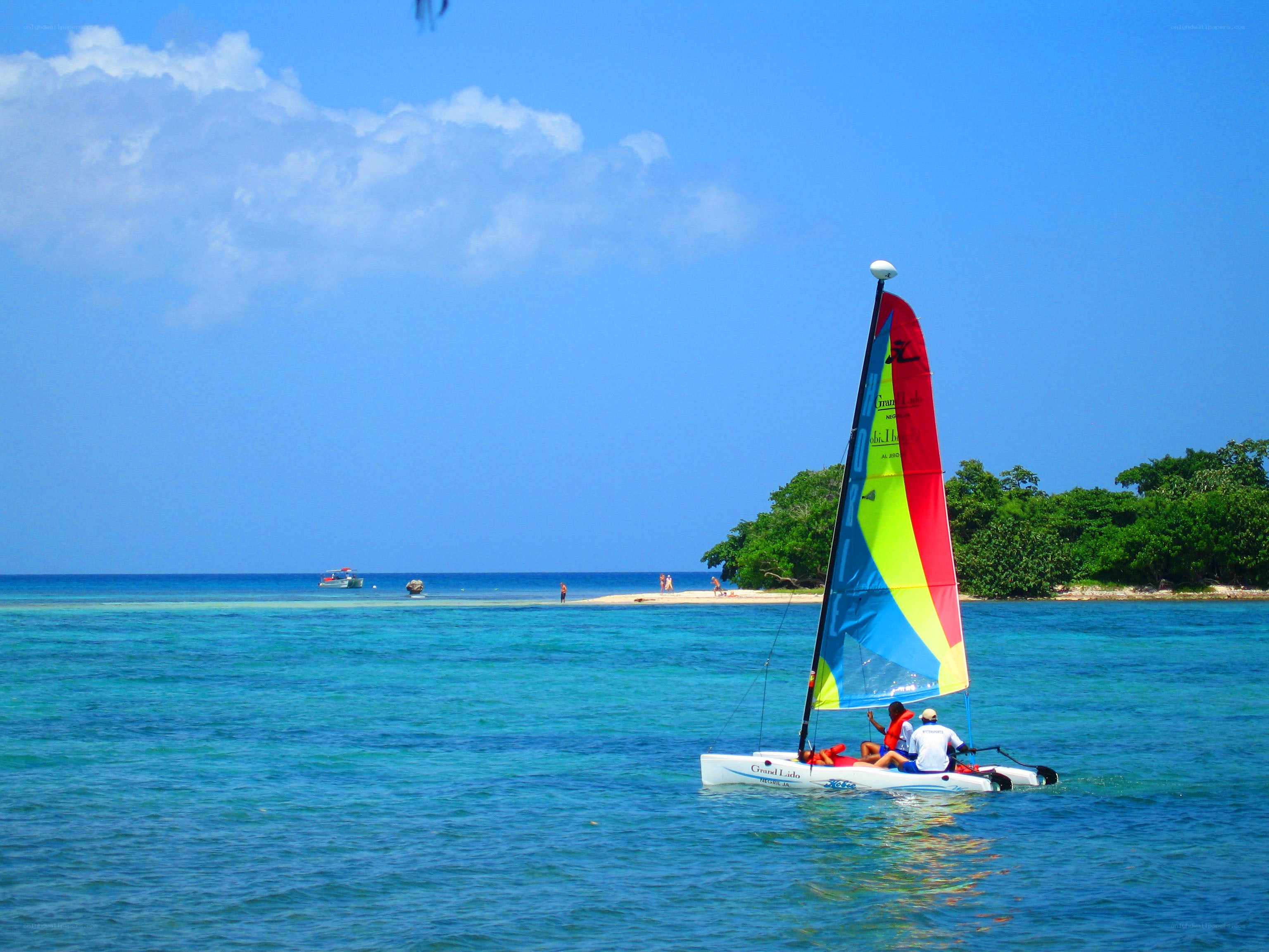 Sailboat on turquoise water