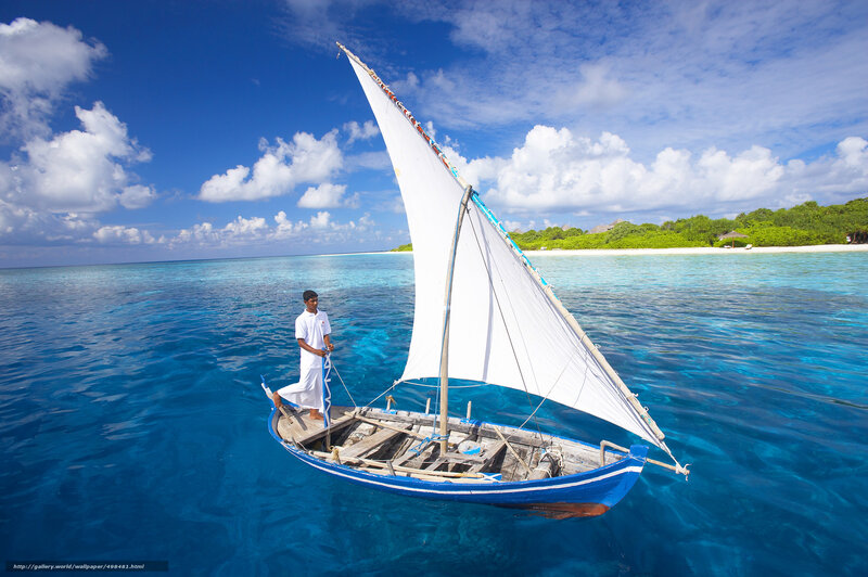 Sailboat on turquoise water