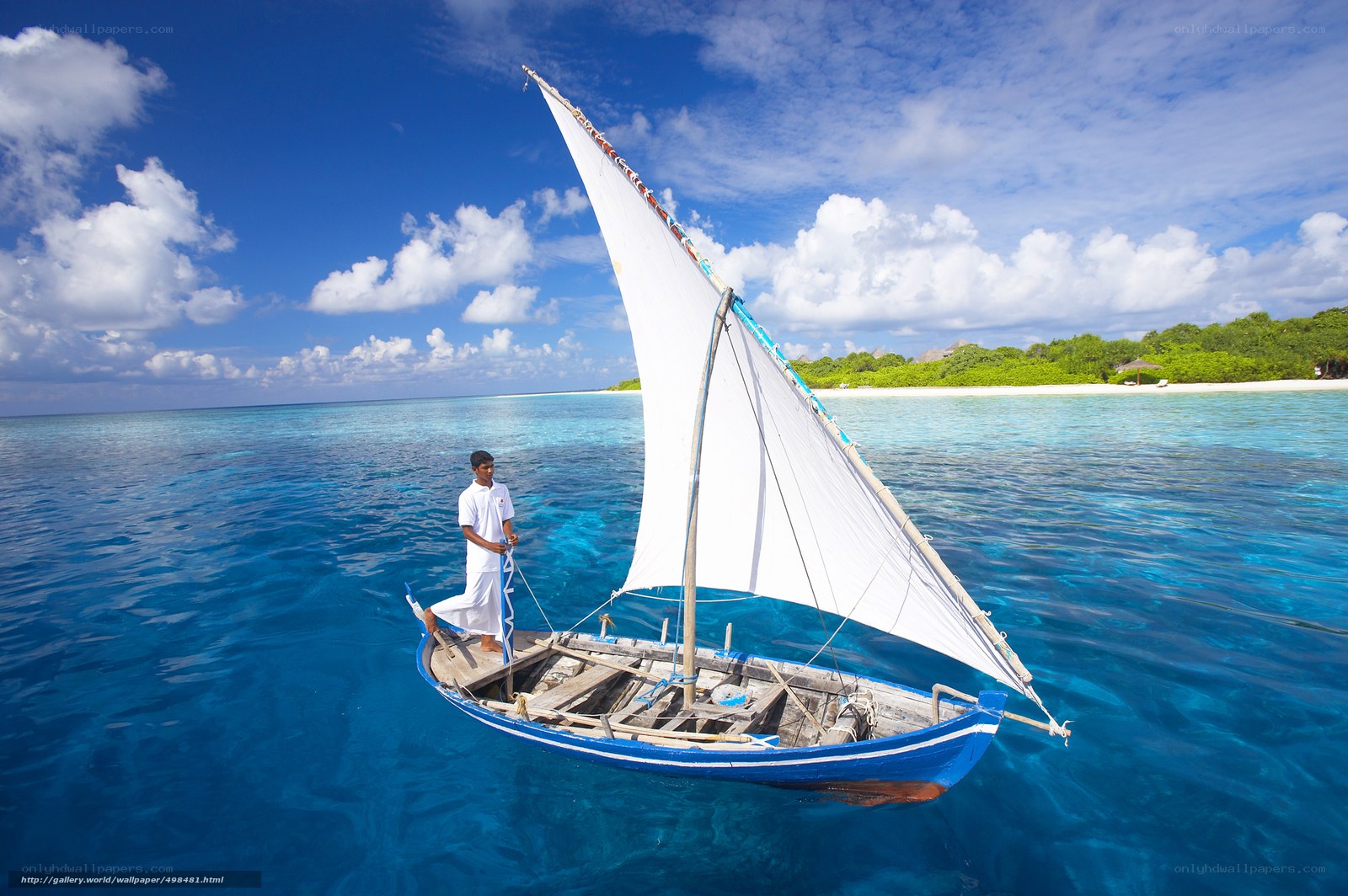 Sailboat on turquoise water