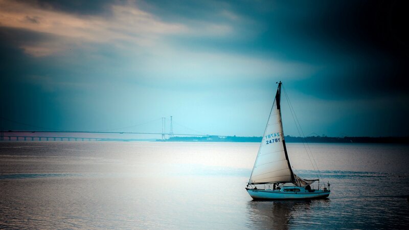 Sailboat on Water — Blue, Dramatic, Sunset, Photograph, Bridge