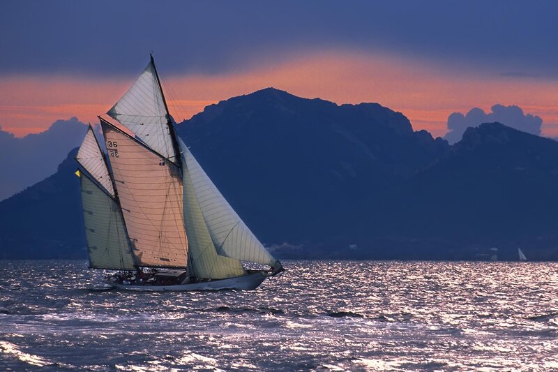Sailboat on Water — Blue, Serene, Sunset, Photograph, Mountains