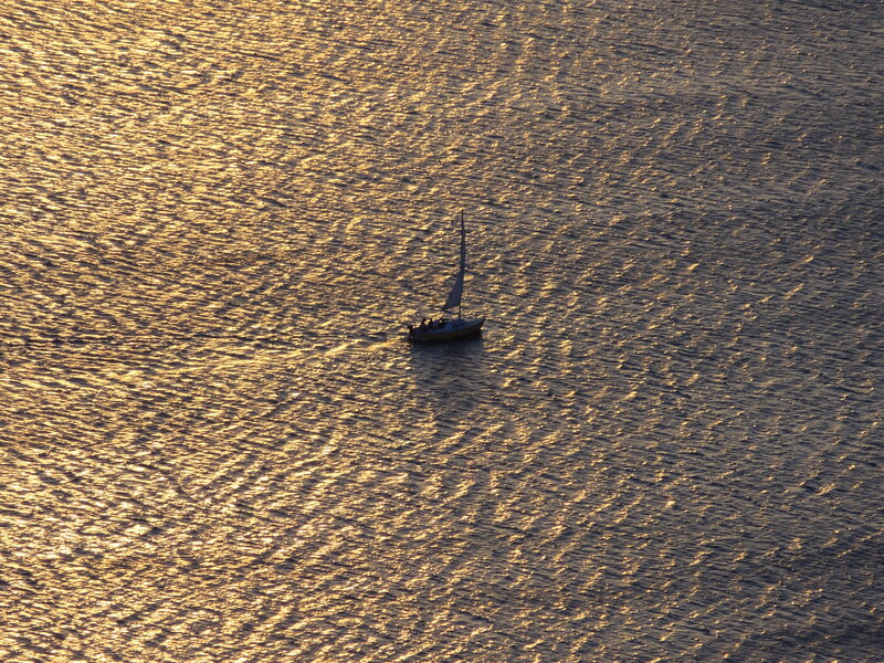 Sailboat on Water — Gold, Serene, Sunset