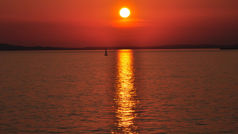 Sailboat on Water — Red, Serene