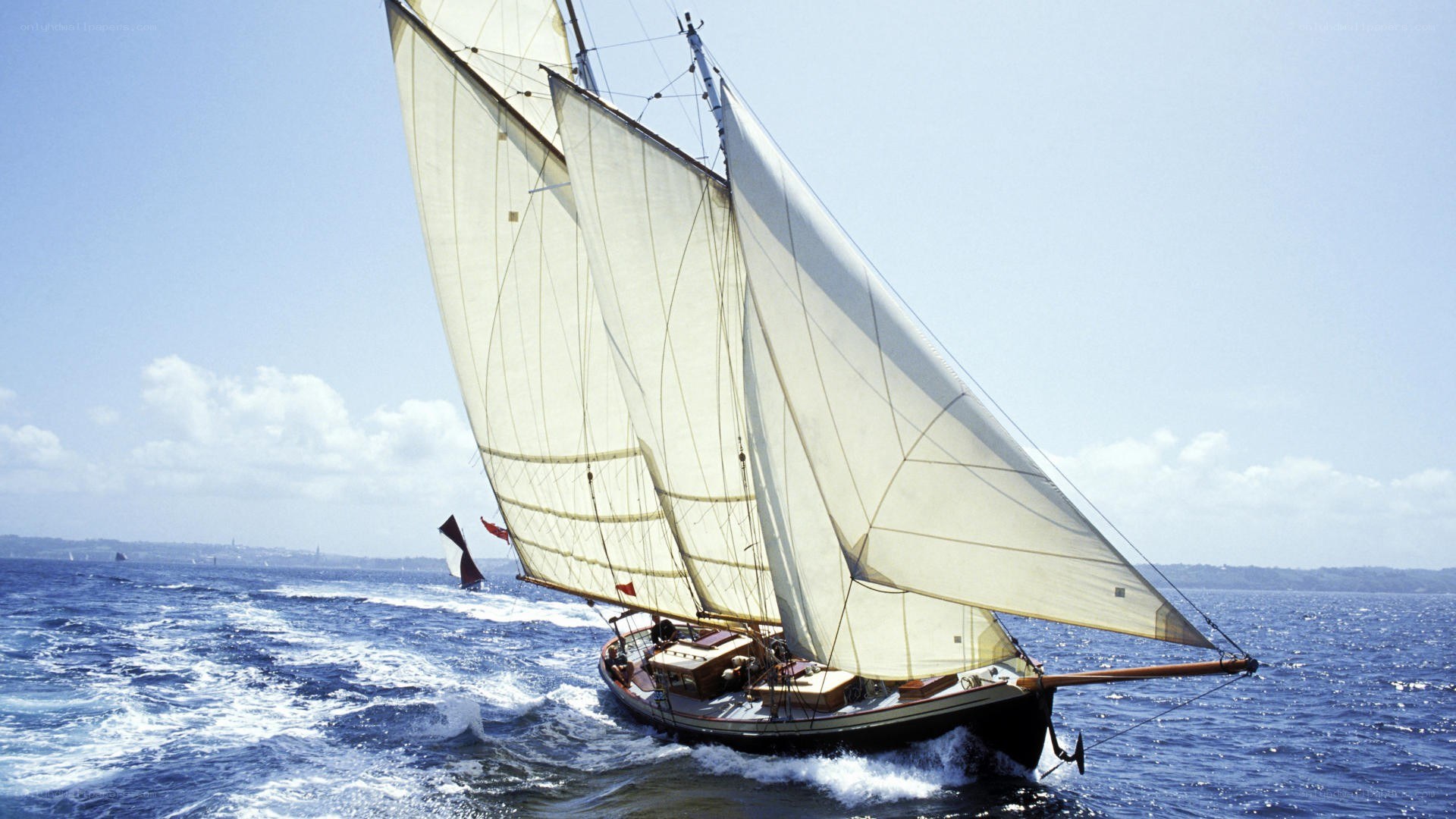 Sailboat sailing on open sea