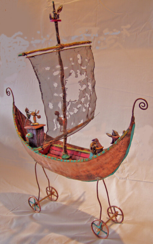 Sailboat sculpture on wheels