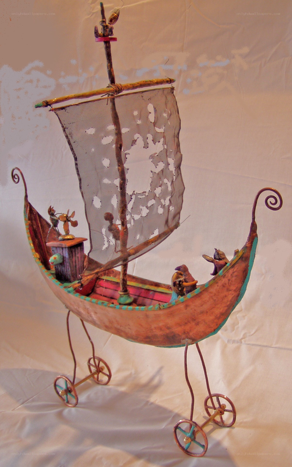 Sailboat sculpture on wheels