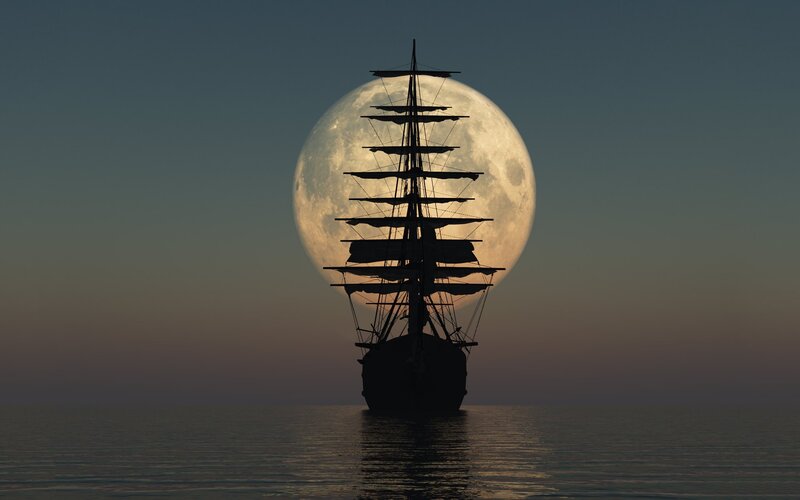sailboat silhouette at moonrise