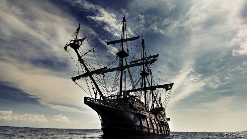 sailboat silhouette on the ocean