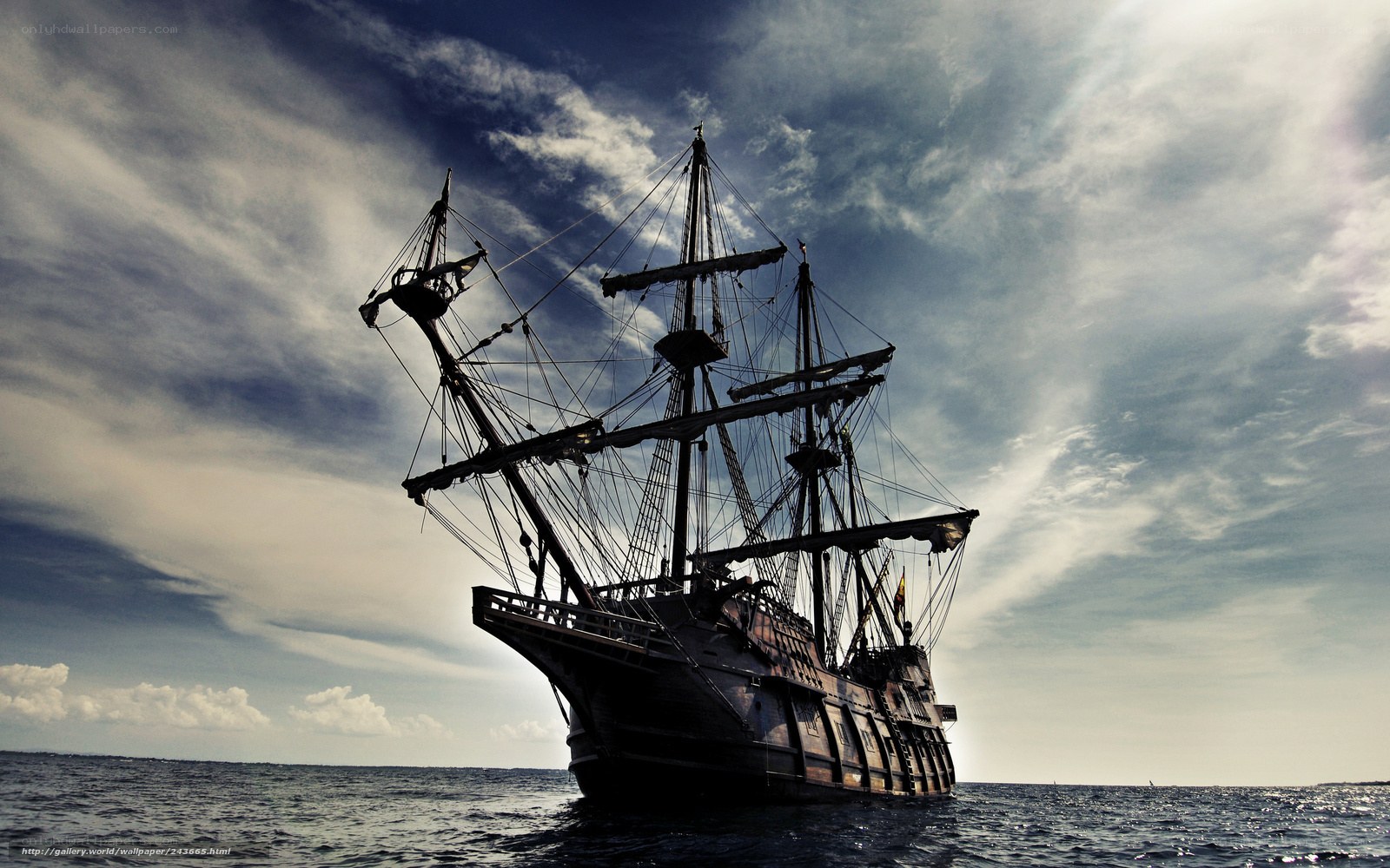 sailboat silhouette on the ocean