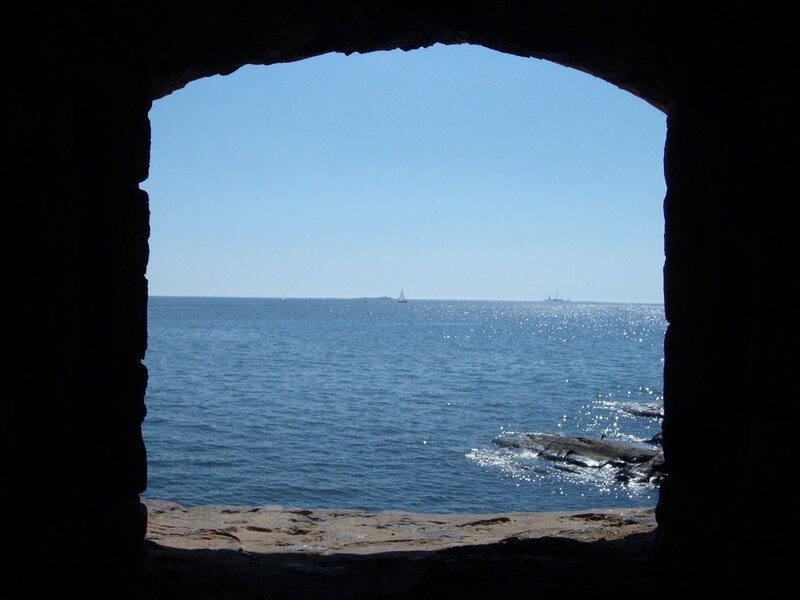 Sailboat Through Stone Arch