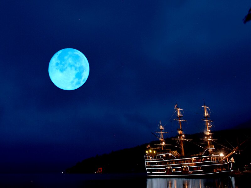 Sailboat under Blue Moon