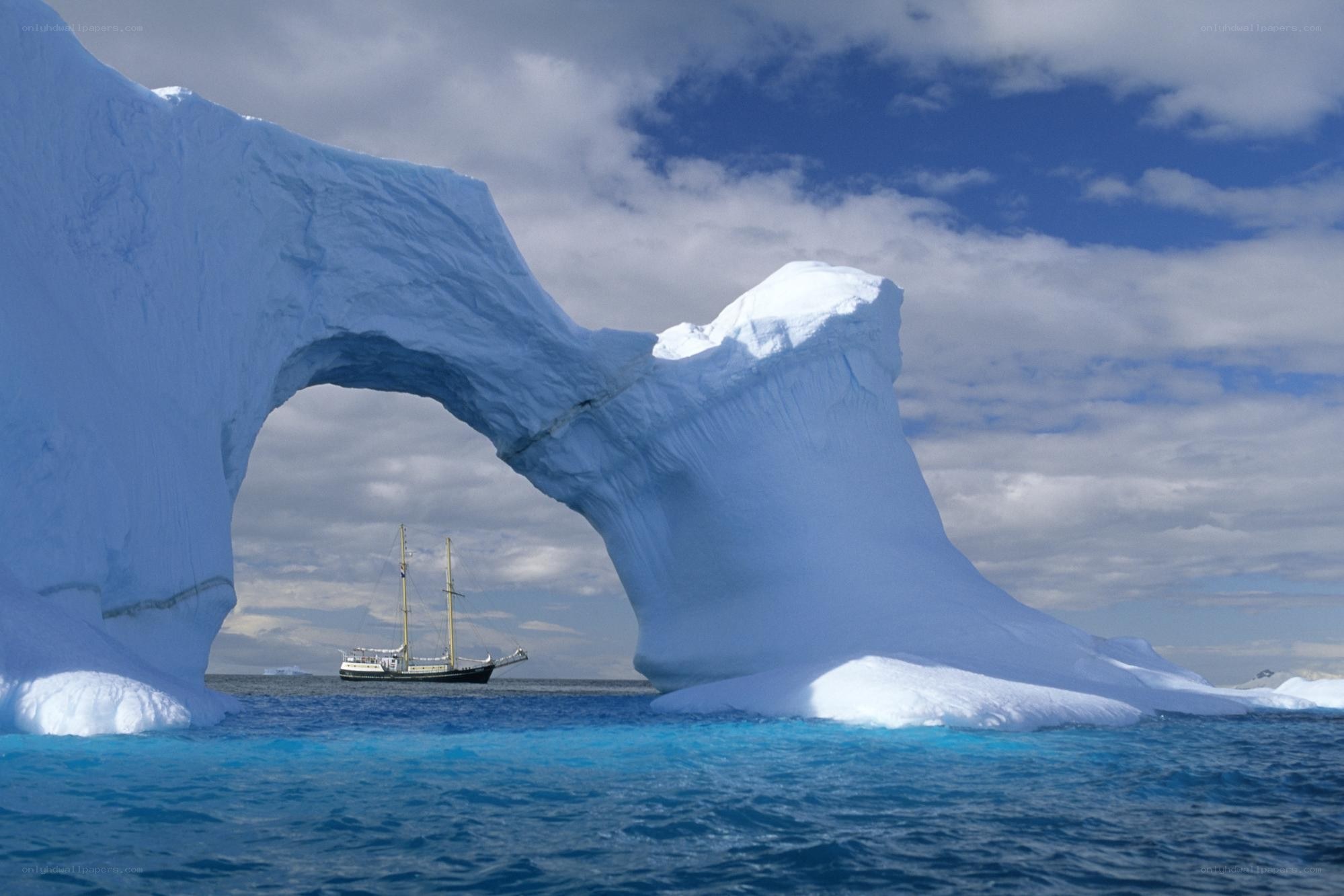 Sailboat under ice arch