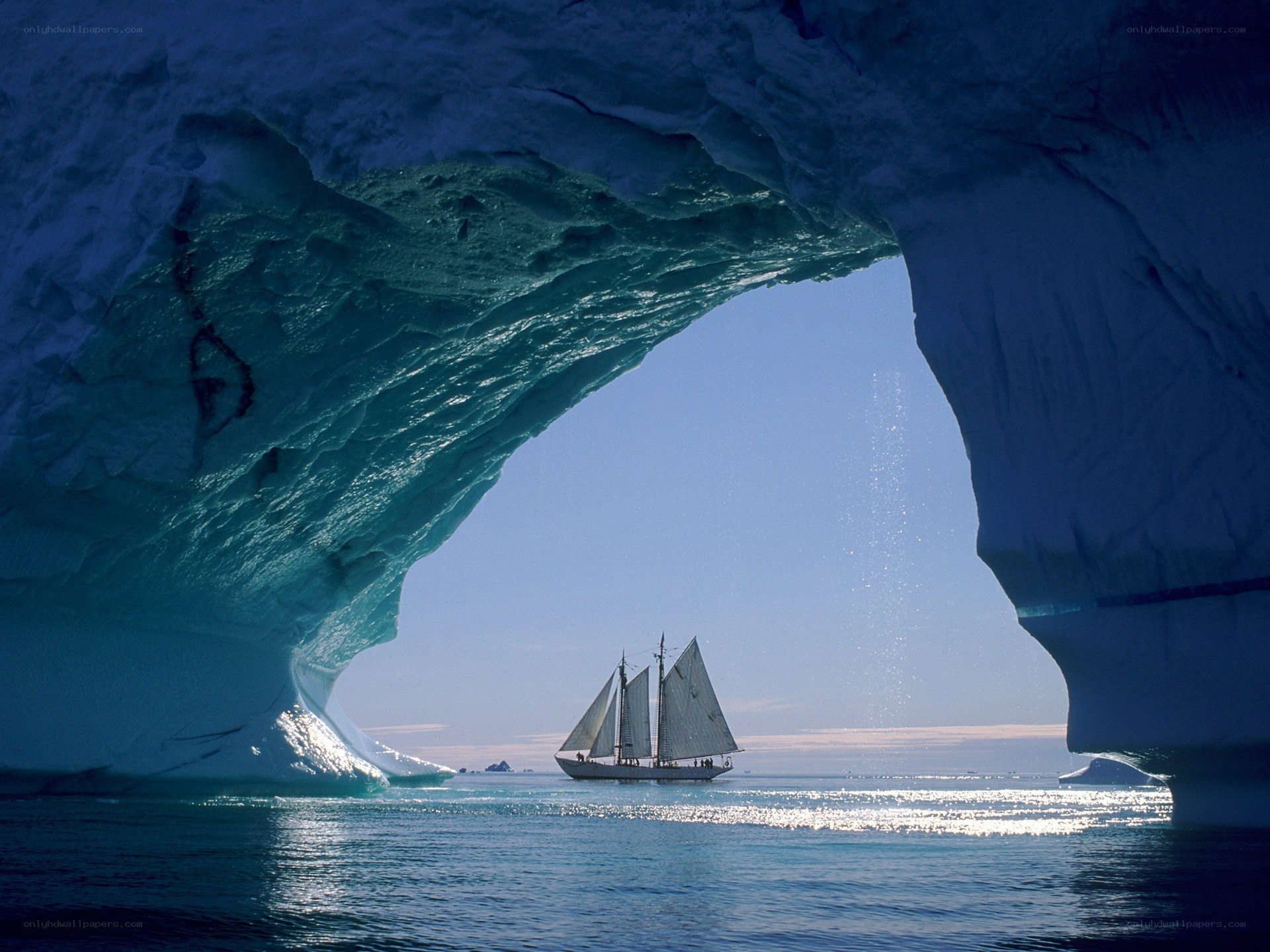 Sailboat under ice arch