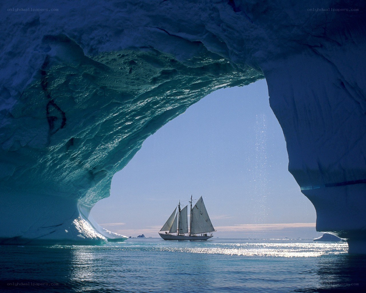 Sailboat under ice arch