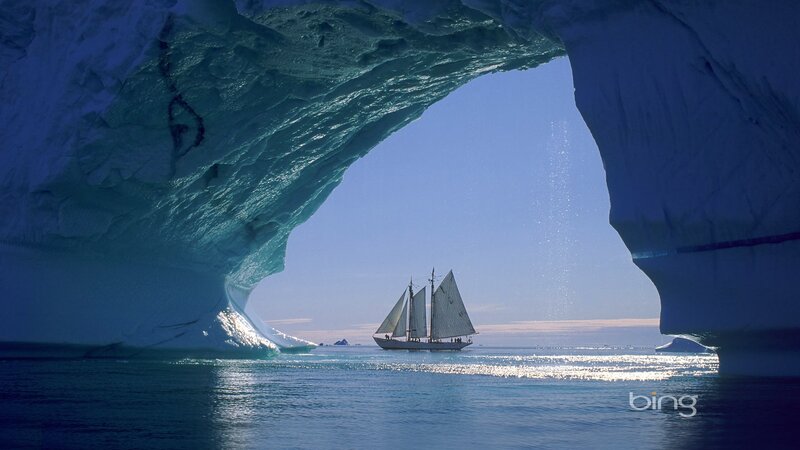 Sailboat under Ice Arch — Blue, Serene, Afternoon, Photograph, Ice Arch, Ocean