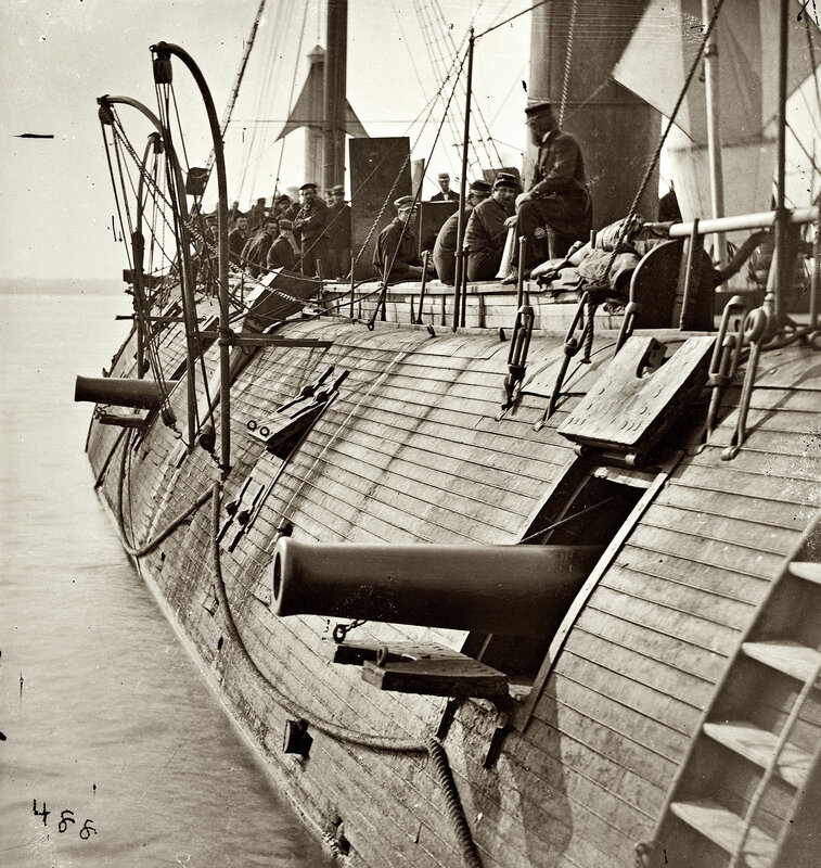 Sailboat with cannons on deck