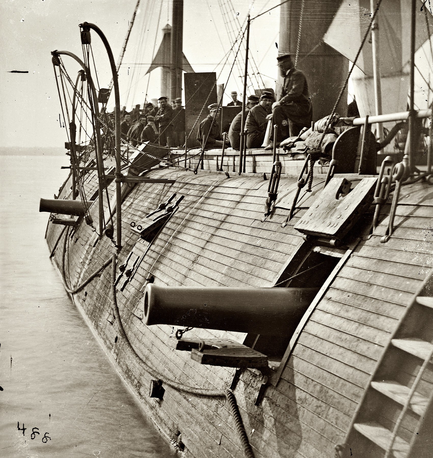 Sailboat with cannons on deck