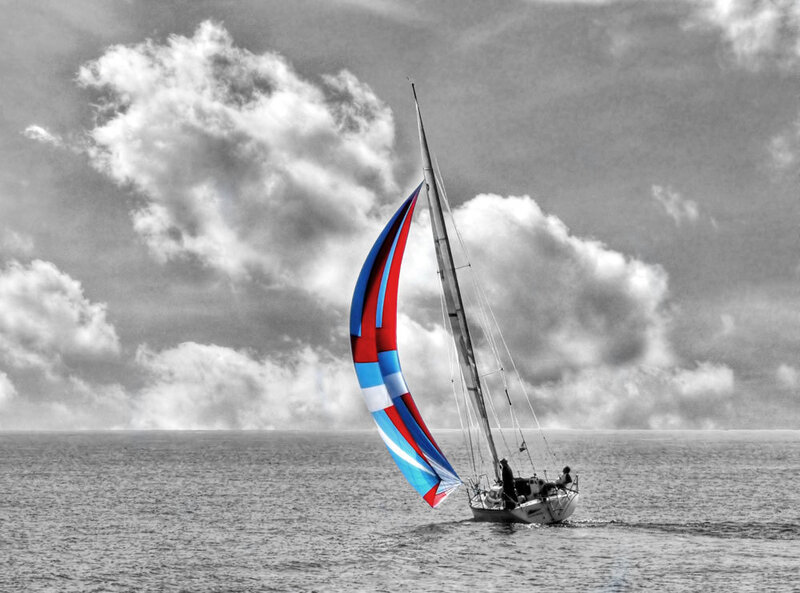 Sailboat with colorful sail