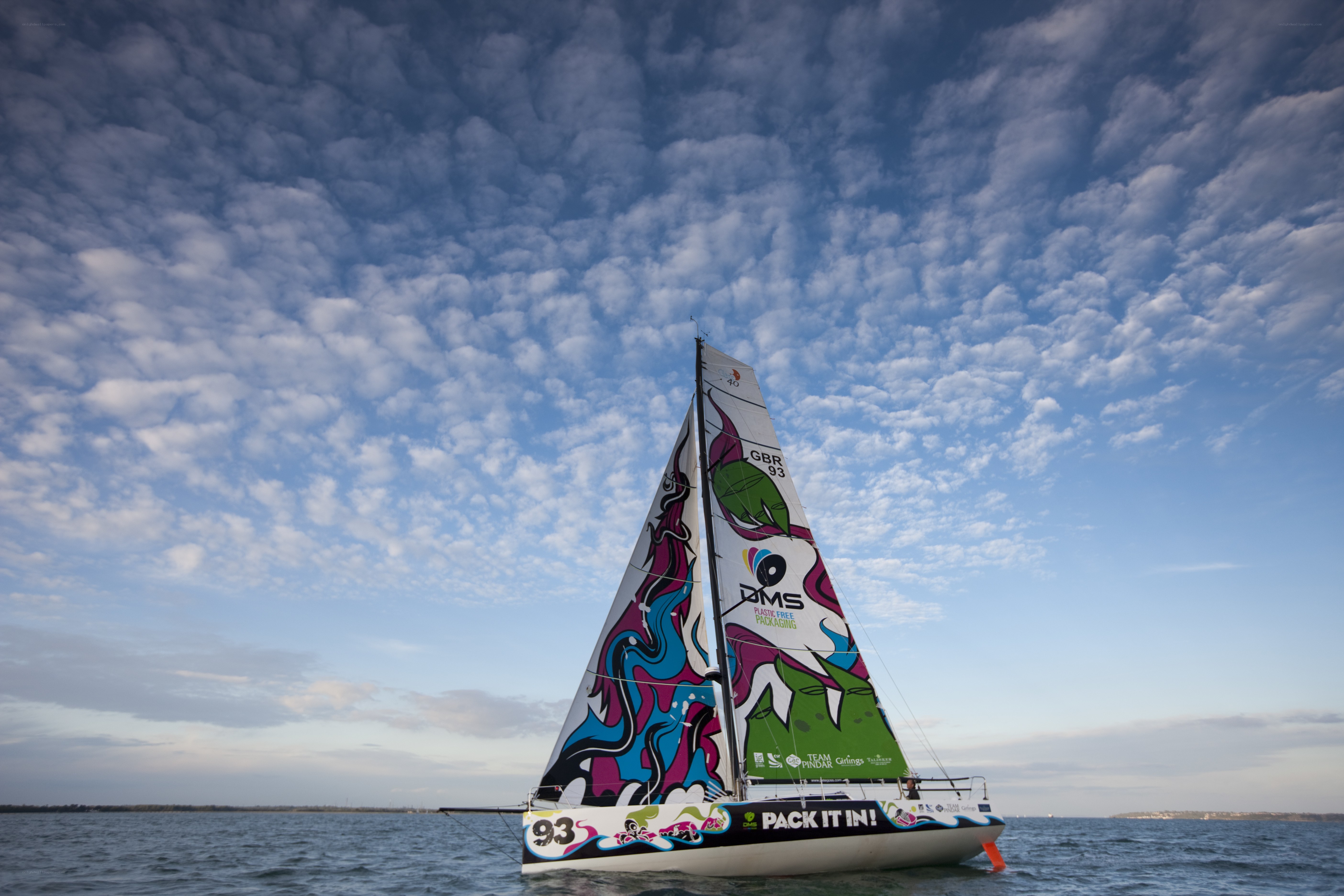 sailboat with colorful sail