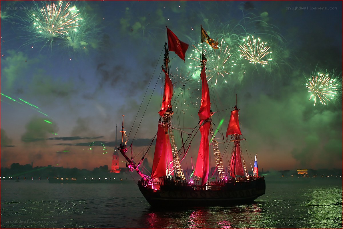 Sailboat with fireworks at night