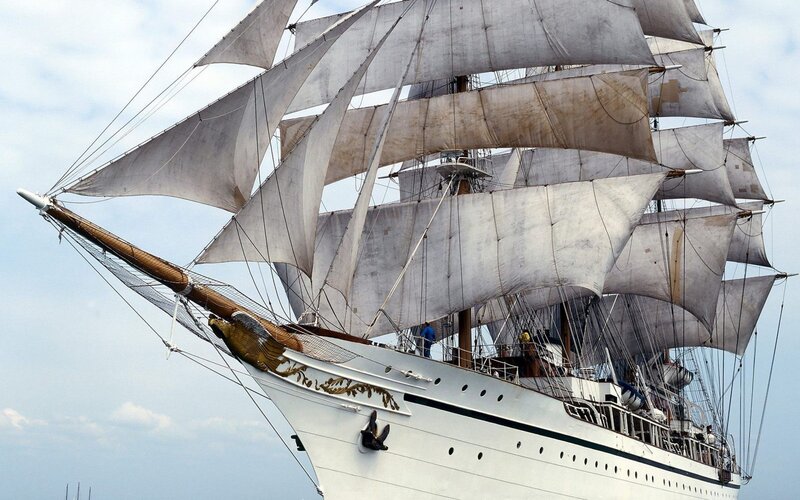 sailboat with full sails