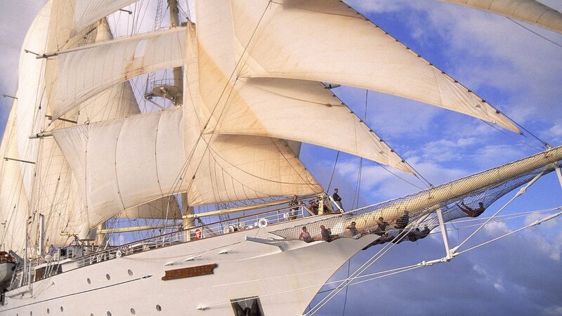 Sailboat with full sails