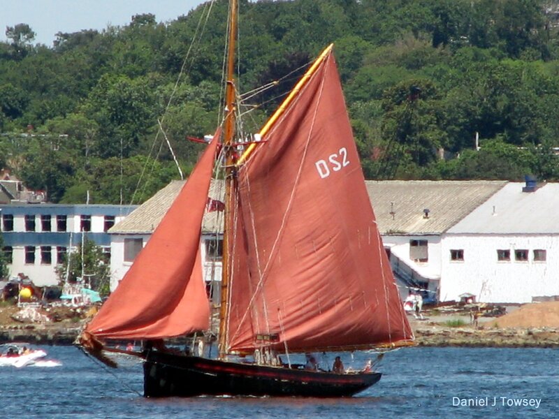 Sailboat with red sails