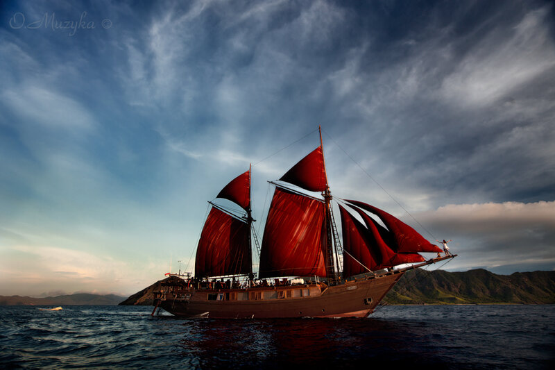 Sailboat with Red Sails — Dramatic, Sunset, Photograph, Ocean