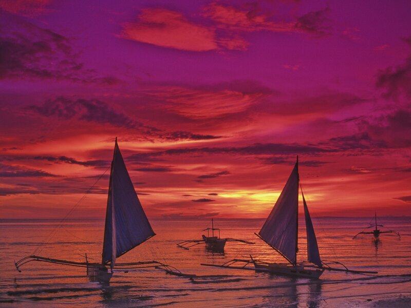 Sailboats at sunset