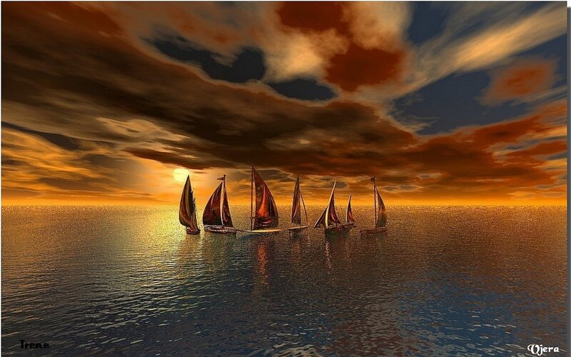 Sailboats at sunset on calm sea