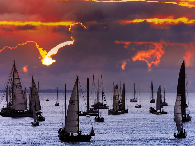 Sailboats at sunset on the water