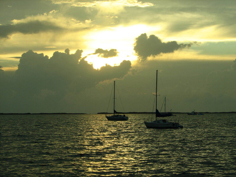 Sailboats at sunset on the water