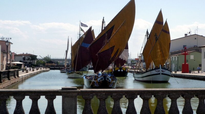 sailboats in a canal