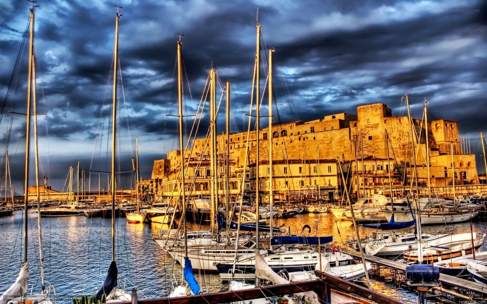 Sailboats in a historic harbor