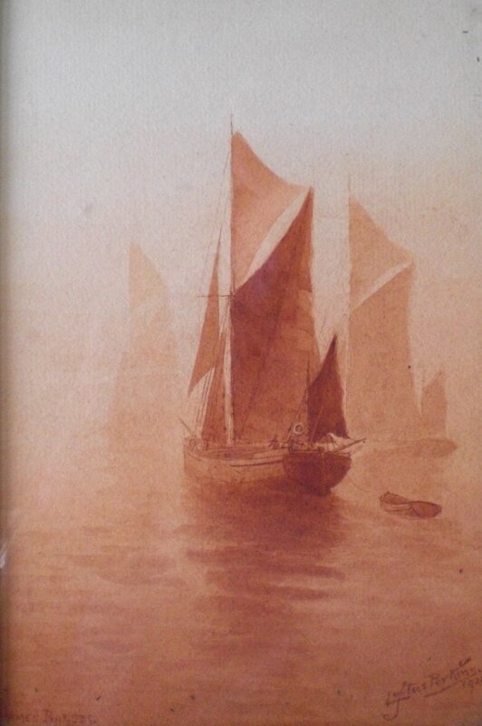 Sailboats in a misty harbor