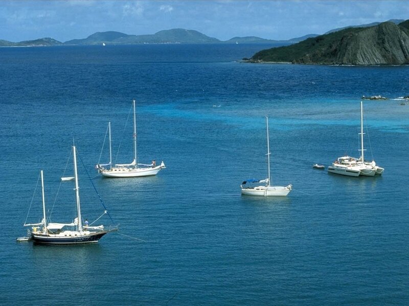 Sailboats in a tropical bay