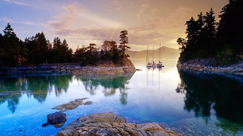 Sailboats in Calm Bay — Blue, Serene, Sunset